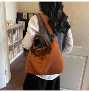 Stylish corduroy tote bag for women, large capacity shoulder bag, casual everyday handbag.