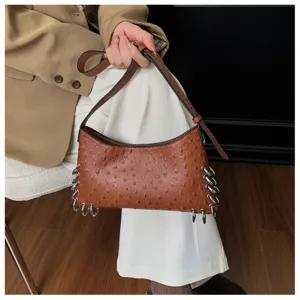 Brown ostrich texture shoulder bag with punk metal rings, stylish underarm bag for women.