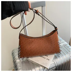 Brown ostrich pattern leather shoulder bag with punk metal rings, chic daily baguette bag.