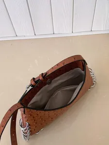 Ostrich pattern punk chain shoulder bag for women, trendy metal ring underarm bag.
