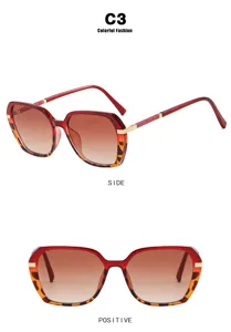Detailed views of vintage red and tortoise shell square sunglasses with gradient lenses.