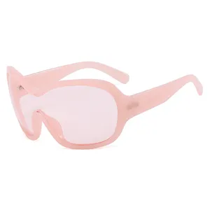Futuristic pink Y2K one-piece oversized sunglasses for trendy street style look