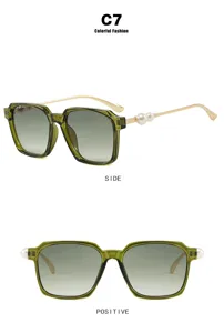 Moderne eckige grüne Sonnenbrille mit eleganten Perlenakzenten in Front- und Seitenansicht