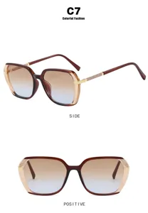Detail view of retro square color-blocked sunglasses with brown gradient lenses