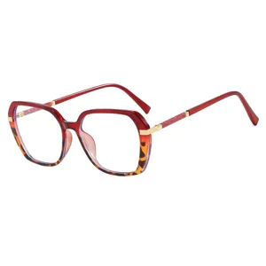 Vintage square color-block sunglasses with red and tortoiseshell frames and glitter temples