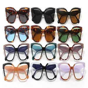 Collection of trendy cat-eye glasses frames with studs in various frame and lens colors.