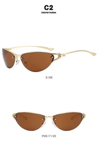 Macro detail view of Y2K metal half-frame cat-eye sunglasses with gold frame and brown lenses