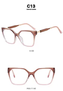 Square oversized cat-eye glasses with clear lenses and vintage gradient brown frame
