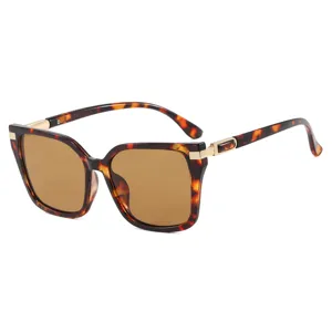 Vintage square tortoiseshell sunglasses with brown lenses and gold metal accents
