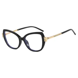 Eleganti occhiali da sole cat-eye per donna con preziose stanghette in oro e strass