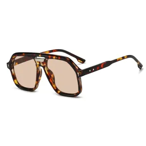 Tortoise shell aviator sunglasses with double bridge and arrow pins for a stylish retro look.