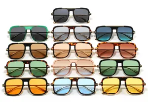 Vista dettagliata di occhiali da sole quadrati alla moda da donna, ideali per la guida.