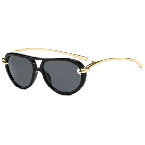 Occhiali da sole aviator classici con montatura nera e stanghette dorate a nodo