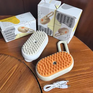 Cepillo de masaje eléctrico con spray para gatos y perros con caja y cable USB