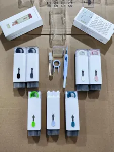 Top view of the 7-in-1 cleaning tool kit showing all components and colors