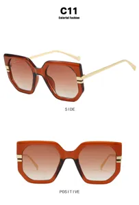 Irregular large-frame sunglasses with golden temples in caramel brown