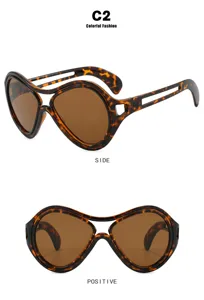 Übergroße Party-Sonnenbrille im Dämonen-Stil mit Schildpatt-Rahmen und braunen Gläsern