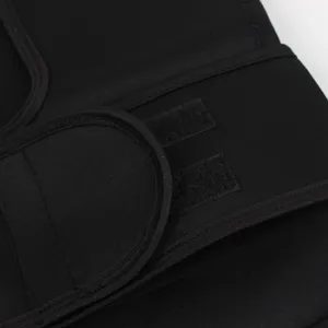 Detail view of adjustable double velcro straps on men's black sauna sweat vest for waist trimming