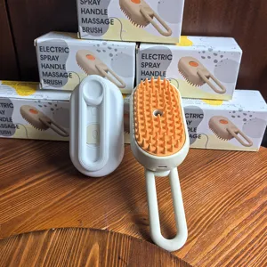Cepillo de masaje eléctrico con spray para mascotas con cerdas de silicona blanca suave