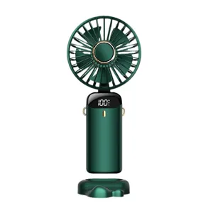 Tragbarer Handventilator mit LED-Batterieanzeige und Ladestation in Dunkelgrün