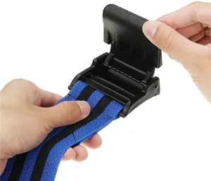 Detail of the adjustable locking buckle on a blue and black BFR occlusion training band.