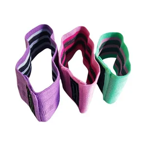 Set of three colorful fabric hip resistance bands for squat and yoga training