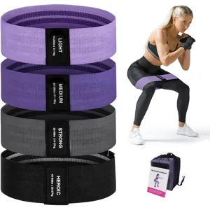 Set of four fabric resistance bands for hip and glute workouts including a mesh storage bag