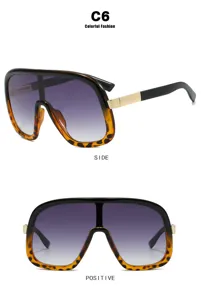 Occhiali da sole oversize con montatura tartarugata e lenti viola in vista laterale e frontale
