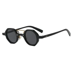 Stylish hip-hop punk sunglasses with irregular round black frames and gold bridge for women