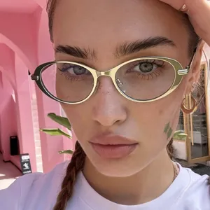 Lunettes de Soleil Ovales Rétro Femmes Monture Métallique Protection UV400 Minimaliste Style Ins Lunettes de Mode pour Voyage Fête