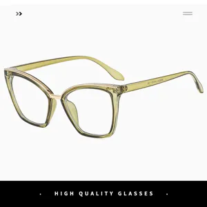 Nahaufnahme Detail der Vintage Katzenauge Blaulichtfilter Brille mit grünem und Goldrahmen.
