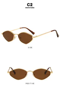 Detail view of stylish polygon metal frame sunglasses with brown lenses and gold finish