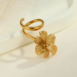 Detailed view of a vintage gold-plated stainless steel ring with 3D flower texture