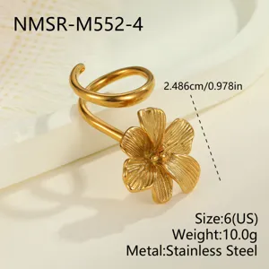 Detailed macro view of a vintage gold-plated stainless steel flower ring with textured petals
