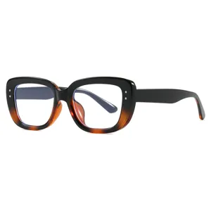 Trendy black and tortoise square anti-blue light eyeglass frames with decorative studs