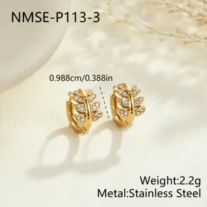 Detail view of small stainless steel gold plated leaf hoop earrings with cz stones