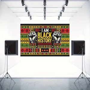 Black History Month photography backdrop with fist design and vibrant African patterns.