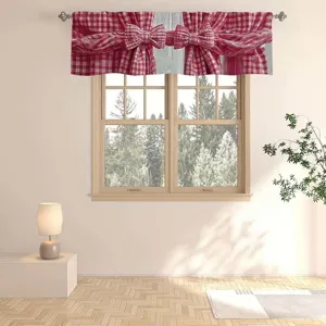 Red and white gingham window valance with decorative bow tie design