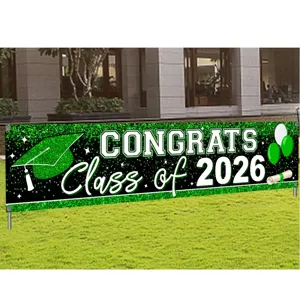 Large green glitter Class of 2026 graduation party banner with mortarboard and balloon motifs