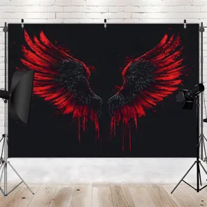 Sfondo fotografico con ali rosse e nere stile arte oscura per servizi in studio