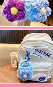 Detail of hand-knitted flower mini bag used as a cute white backpack charm