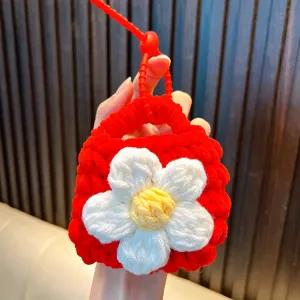 Handmade red crocheted mini coin purse with white daisy flower charm