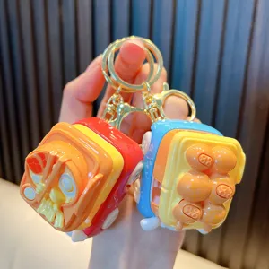 Simpatico portachiavi per mini auto di cartoni animati, giocattolo di decompressione.