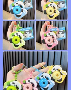 Cartoon panda projection camera keychains in blue, pink, yellow, and green colors