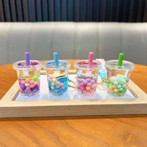 Exquisite miniature milk tea cup liquid quicksand keychains with colorful candy beads