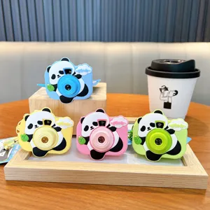Set of cartoon panda projection camera keychains in blue, yellow, pink, and green colors