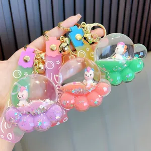 Cute acrylic oil-filled unicorn cat paw floating liquid keychain gift for girls