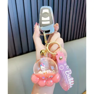 Creative pink acrylic floating liquid keychain with unicorn inside a paw-shaped bottle