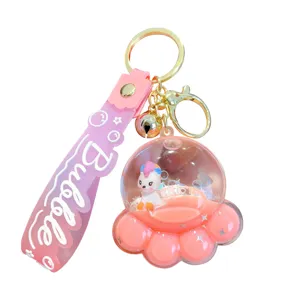 Creative pink acrylic oil liquid quicksand keychain with floating unicorn in paw bottle