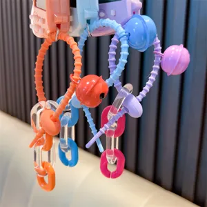 Mini retro handheld game console keychains in colorful candy styles for kids' gifts